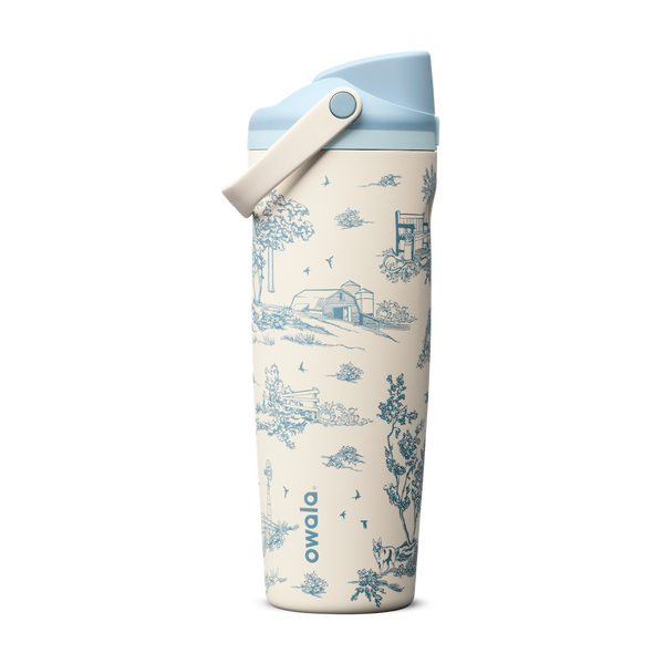 Owala FreeSip Sway 30 oz Toile Be Home, botella crema con paisajes azules, tapa celeste y asa crema